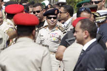 Egyptian Army Chief, General Abdel Fattah al-Sissi (C), is seen in Cairo's Nasr City district in this September 20, 2013, file photo.