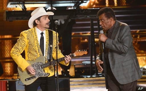 Brad Paisley, left, and Charley Pride perform 