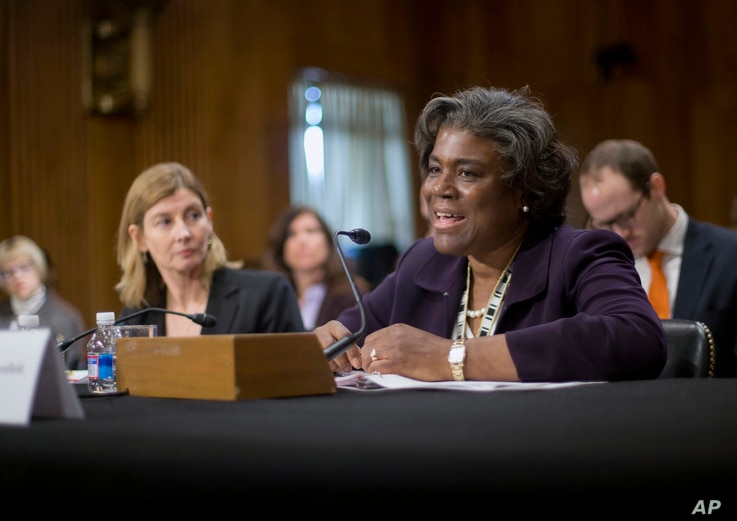 FILE - In this Jan. 9, 2014, file photo Assistant Secretary of State for African Affairs Linda Thomas-Greenfield, right,…