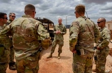 U.S. Army Brig. Gen. Damian T. Donahoe, deputy commanding general, Combined Joint Task Force - Horn of Africa, center, talks…