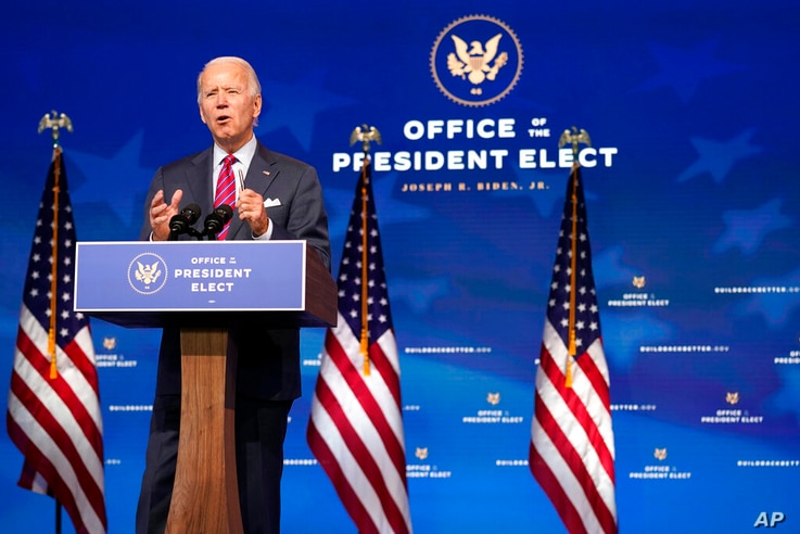 President-elect Joe Biden speaks about jobs at The Queen theater, Friday, Dec. 4, 2020, in Wilmington, Del. (AP Photo/Andrew…