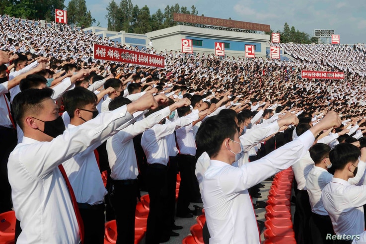 FILE - In this June 6, 2020 file photo, North Korean students stage a rally to denounce South Korea following that defectors…