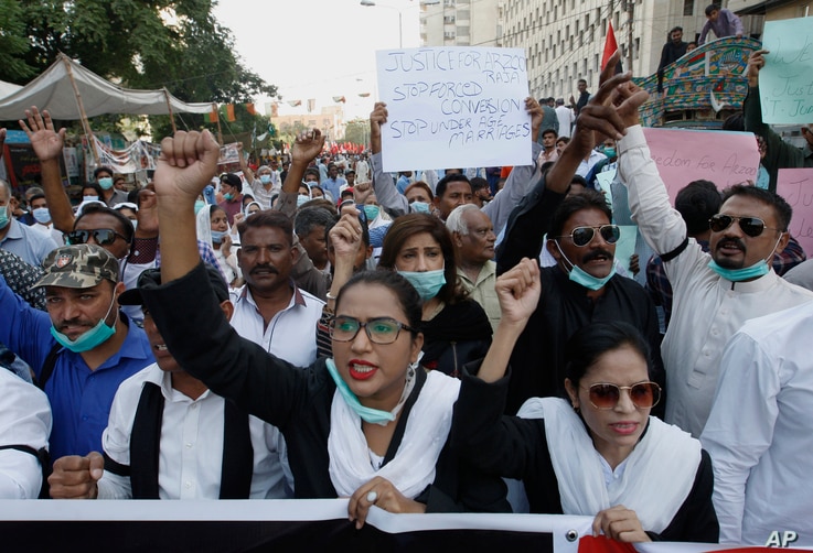 Pakistani Christians protest against child marriage and forced conversion, in Karachi, Pakistan, Nov. 8, 2020. Rights groups…