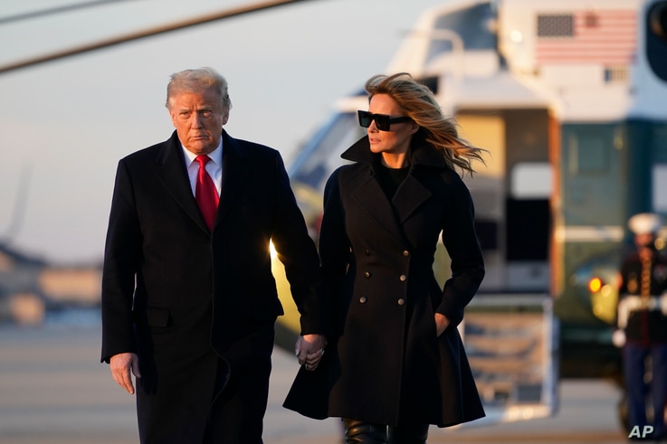 President Donald Trump and first lady Melania Trump board Air Force One at Andrews Air Force Base, Md., Dec. 23, 2020. Trump raveled to his Mar-a-Lago resort in Palm Beach, Florida. 