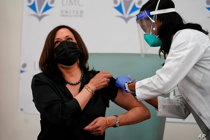 Vice President-Elect Kamala Harris receives the Moderna COVID-19 vaccine from nurse Patricia Cummings, Tuesday Dec. 29, 2020,…