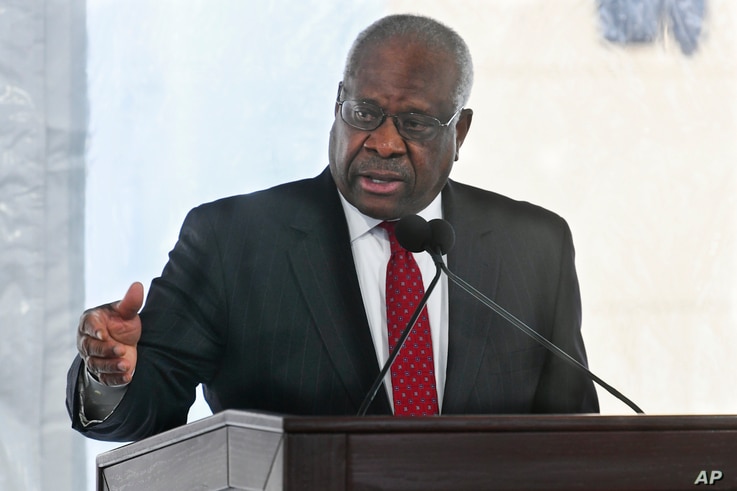 FILE - In this Feb. 11, 2020, file photo, Supreme Court Justice Clarence Thomas delivers a keynote speech during a dedication…