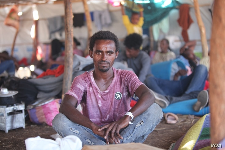 2332: Kafla Gabragargis, 25, fled Ethiopia and now lives in Um Rakouba camp in Sudan, having no contact with any of his friends or family on Dec. 10, 2020. (VOA/ Mohaned Bilal) 