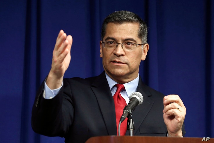 FILE - California Attorney General Xavier Becerra speaks during a news conference in Sacramento, California, March 5, 2019.