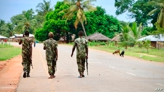 (FILES) In this file photo taken on March 07, 2018 Soldiers from the Mozambican army patrol the streets after security in the…