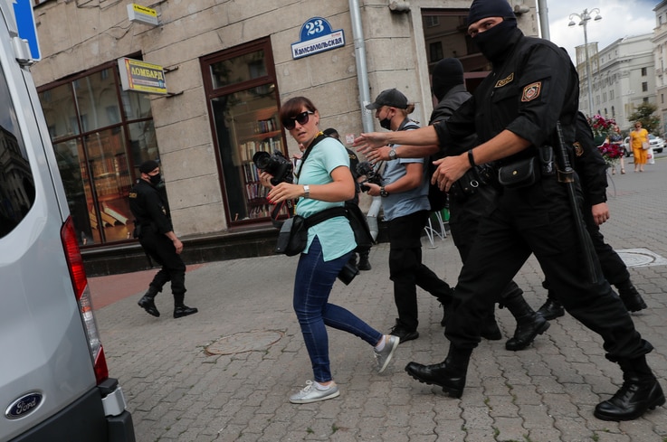FILE - Law enforcement officers detain journalists in Minsk, Belarus, July 28, 2020. 