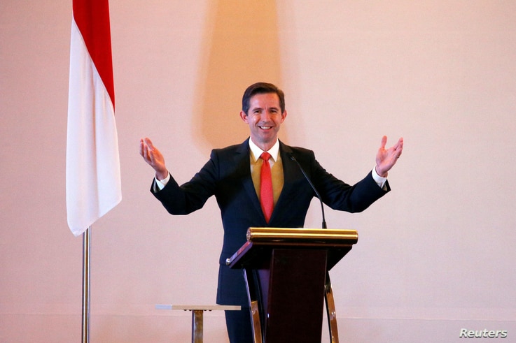 FILE - Australia's Minister of Trade, Tourism and Investment Simon Birmingham speaks during a signing ceremony with Indonesia's Trade Minister in Jakarta, Indonesia, March 4, 2019.