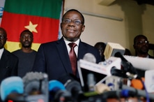 FILE - Maurice Kamto, a presidential candidate of Renaissance Movement (MRC), holds a news conference at his headquarter in Yaounde, Cameroon, Oct. 8, 2018.