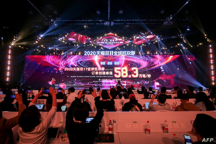A screen shows sales information during the 2020 Tmall Global Shopping Festival on Singles' Day, also known as the Double 11…
