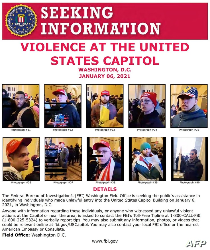 This image released by the FBI on January 8, 2021, shows protesters in the US Capitol on January 6, in Washington, DC. The FBI…