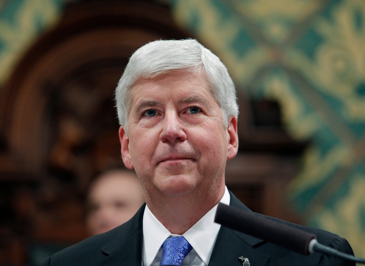 FILE - In this Jan. 23, 2018, file photo, former Michigan Gov. Rick Snyder delivers his State of the State address at the state…