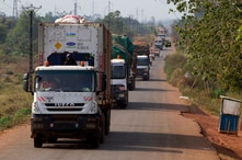 FILE - A convoy of trucks carrying food from the United Nations World Food Programme (WFP) that was stuck at the Cameroon border.