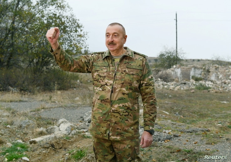 Azerbaijan's President Ilham Aliyev addresses the media as he visits Fuzuli and Jabrayil districts in the region of Nagorno…