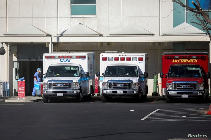 Ambulances are seen outside of St. Francis Medical Center emergency room during a surge of coronavirus disease (COVID-19) cases…