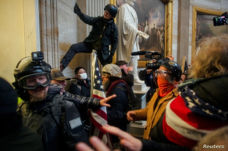 Pro-Trump protesters storm the U.S. Capitol to contest the certification of the 2020 U.S. presidential election results by the…