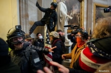 Pro-Trump protesters storm the U.S. Capitol to contest the certification of the 2020 U.S. presidential election results by the…