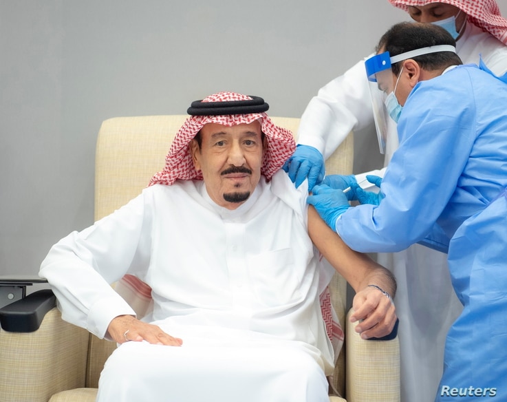 Saudi King Salman bin Abdulaziz gets a dose of a coronavirus disease (COVID-19) vaccine in Neom, Saudi Arabia, January 8, 2021…