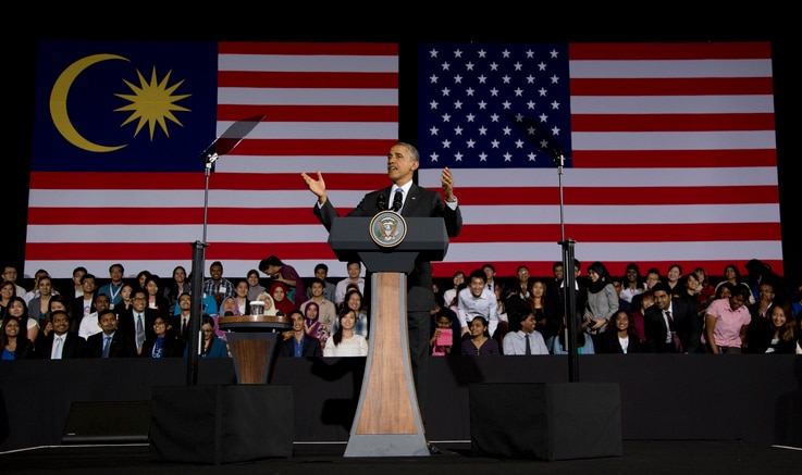 President Barack Obama gestures as he speaks during a town hall meeting at Malaya University in Kuala Lumpur, Malaysia, Sunday, April 27, 2014. 