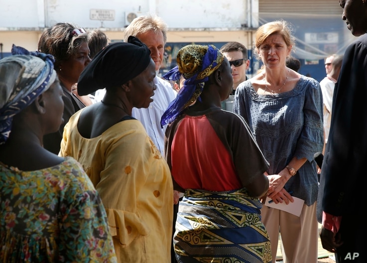U.S. Ambassador to the United Nations Samantha Power speaks to IDP women at the makeshift camp where over 40,000 found refuge at the airport in Bangui, Central African Republic, Dec. 19, 2013.