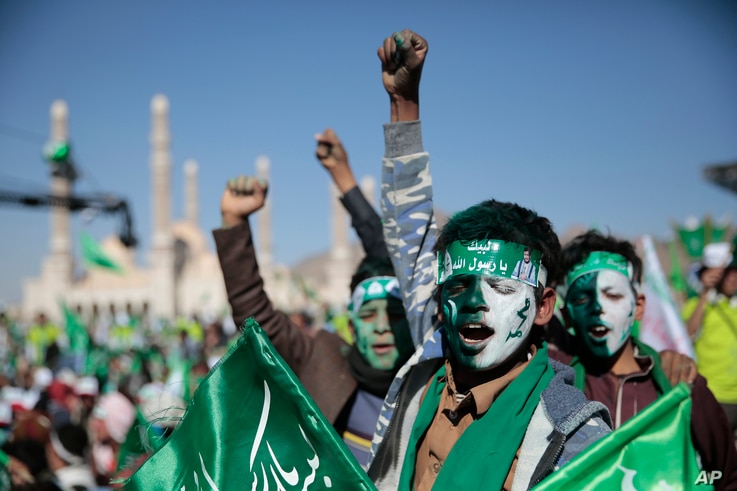Supporters of Shiite rebels, known as Houthis, chant slogans as they attend a celebration of moulid al-nabi, the birth of Islam…