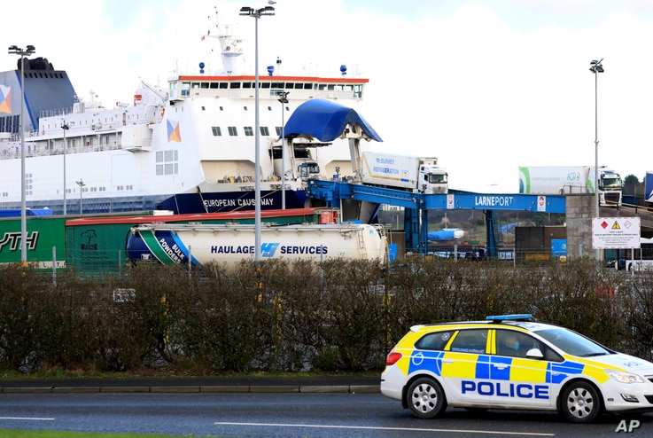 Lorries disembark a ferry from Scotland, at the P&O ferry terminal in the port at Larne on the north coast of Northern Ireland, Jan. 1, 2021.