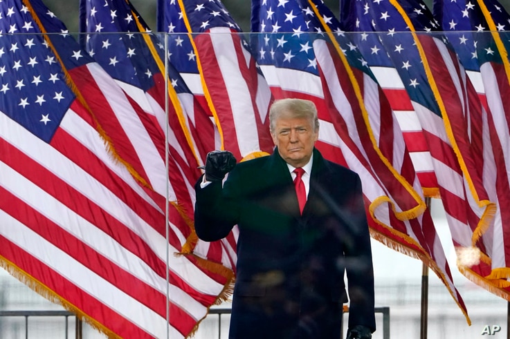 President Donald Trump arrives to speak at a rally, Jan. 6, 2021, in Washington.