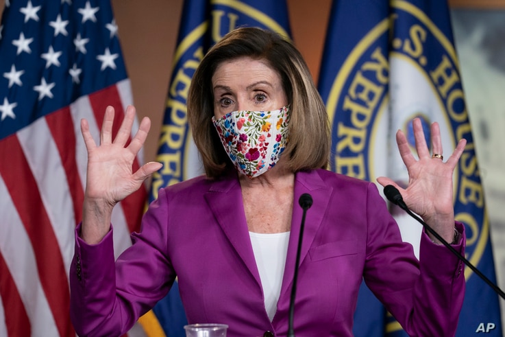 Speaker of the House Nancy Pelosi, D-Calif., holds a news conference on the day after violent protesters loyal to President Donald Trump stormed the U.S. Congress, at the Capitol in Washington, Jan. 7, 2021.