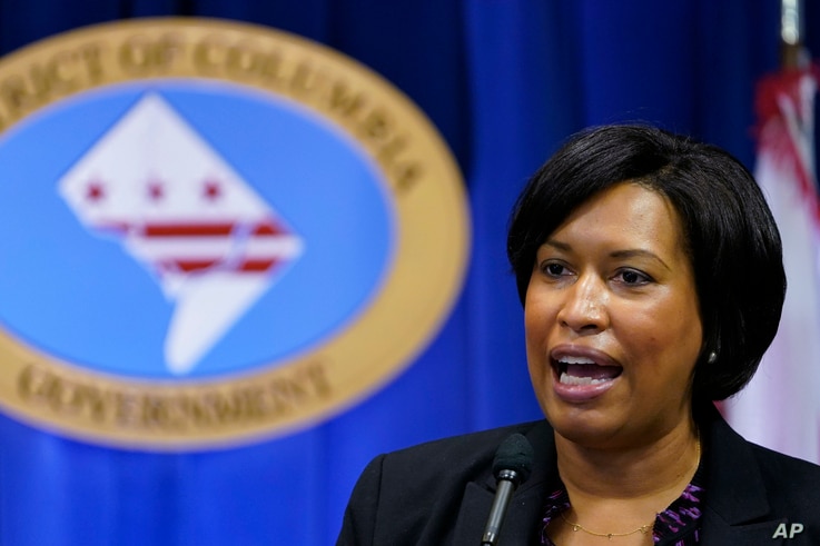 FILE - In this Wednesday, Nov. 4, 2020, file photo, District of Columbia Mayor Muriel Bowser speaks during a news conference in…