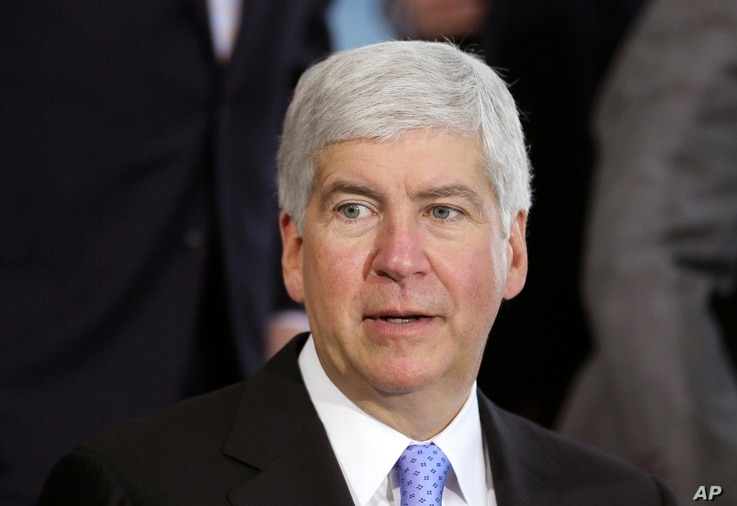 FILE - Michigan Gov. Rick Snyder speaks in Detroit. Snyder is under fire, accused of reacting too slowly to the water crisis in Flint.