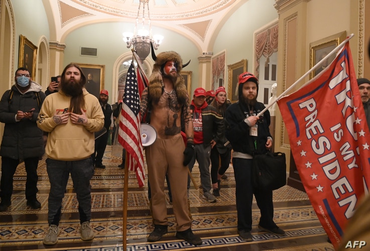 Supporters of President Donald Trump enter the U.S. Capitol, Jan. 6, 2021, in Washington, D.C.