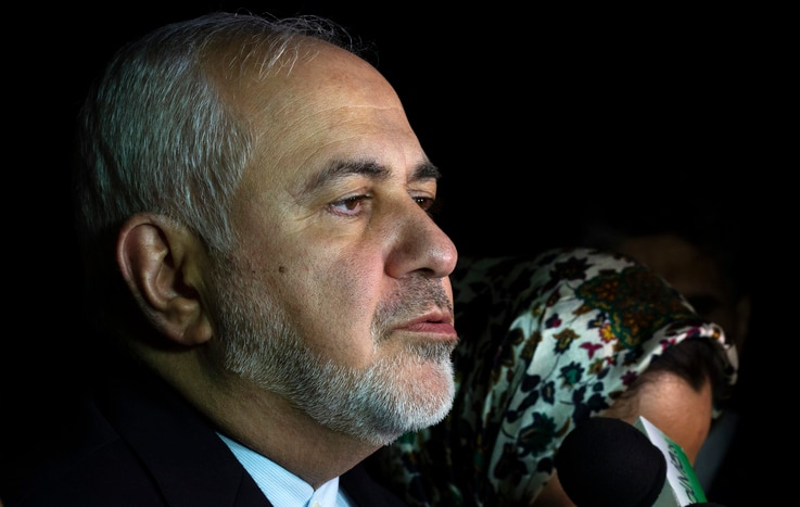 Iran's Foreign Minister Mohammad Javad Zarif speaks to the media after arriving at Viru Viru International Airport in Santa…