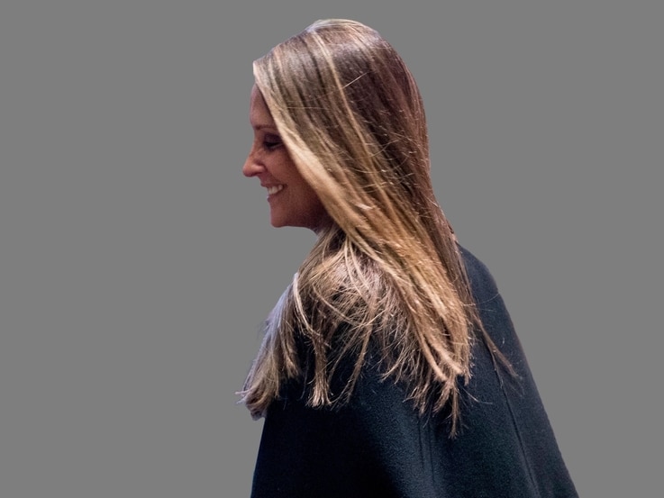 Stephanie Winston Wolkoff  headshot, former senior advisor to US First Lady Melania Trump, graphic element on gray