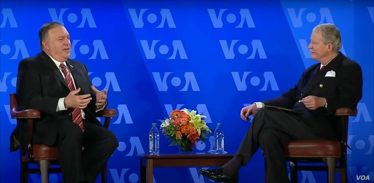 Secretary of State Michael Pompeo has a conversation with VOA Director Robert Reilly at the Voice of America headquarters in Washington, Jan. 11, 2021.