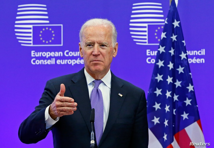 FILE - Then-U.S. Vice President Joe Biden speaks ahead of a meeting at European Council headquarters in Brussels, Belgium, Feb. 6, 2015.