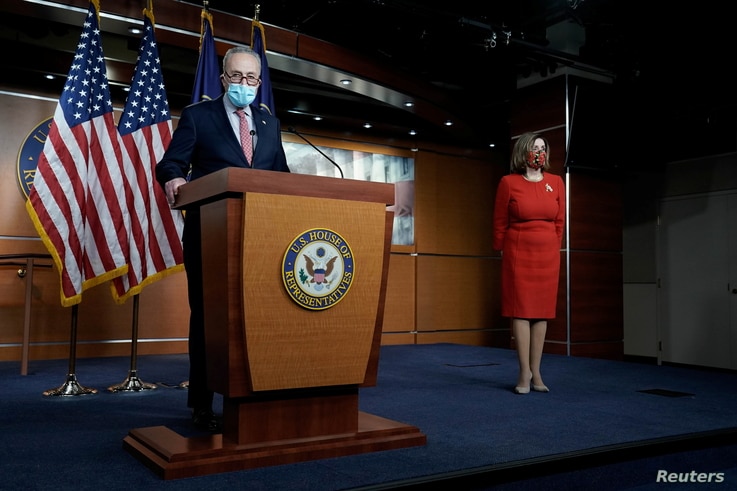 Senate Minority Leader Charles Schumer (D-NY) speaks to reporters on an agreement of a COVID-19 aid package with Speaker of the House Nancy Pelosi (D-CA) on Capitol Hill Washington, D.C., Dec. 20, 2020.